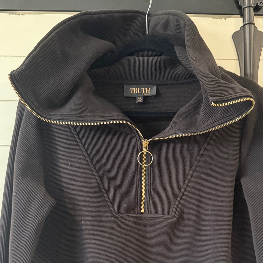 Truth Black womans Sweater with Gold Zipper